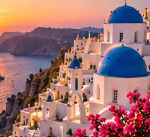 Blue-domed churches and white houses above the Santorini caldera at sunset